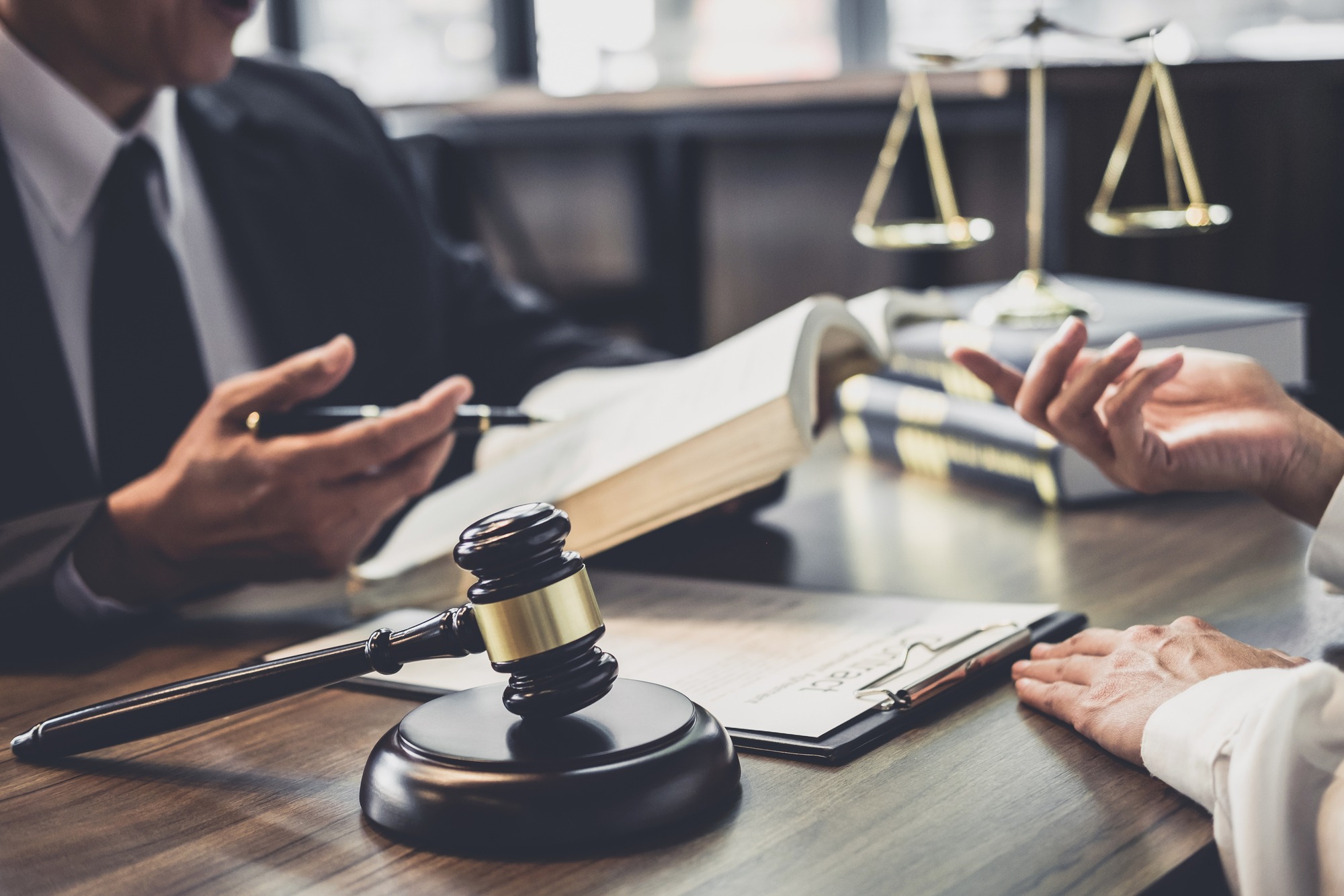 Good service cooperation, Consultation of Businesswoman and Male lawyer or judge counselor having team meeting with client, Law and Legal services concept.; Shutterstock ID 1248019606; purchase_order: Limited 7/23/21